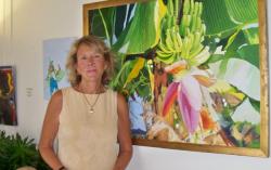Marjorie Robbins with one of her large-scale oil paintings. Marjorie Robbins with one of her large-scale oil paintings.